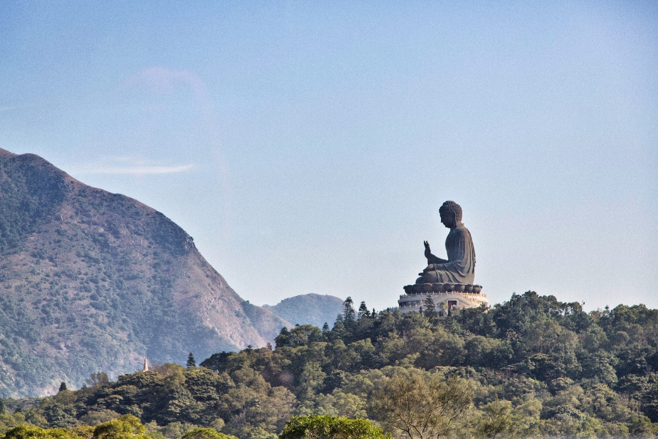Buddha statue on a hill.